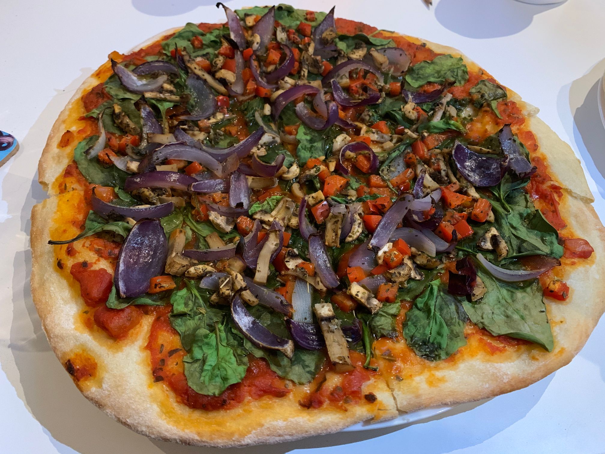 Een foto van groente pizza